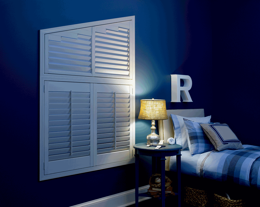 boy's blue bedroom with room darkening shutters Hunter Douglas Rocklin 95765