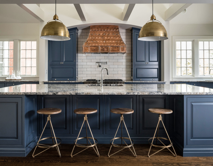 kitchen with blue cabinets and metal enhancements California window fashions