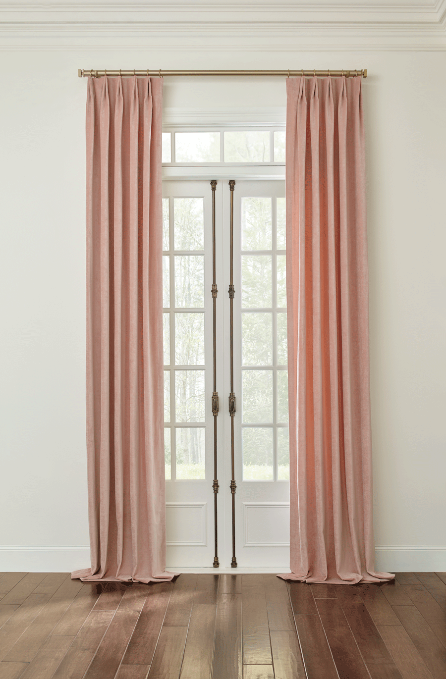 drapery panels installed above french doors with puddled bottom Roseville CA