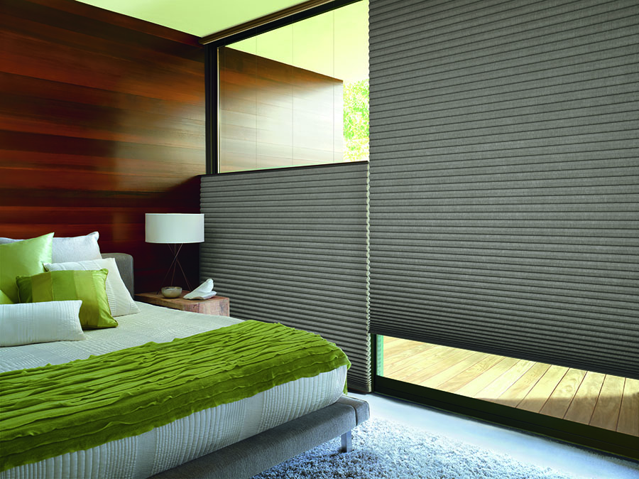 Honeycomb Shades with LiteRise® in a bedroom.