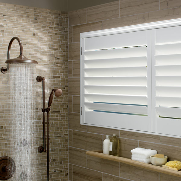 white shutters inside a shower