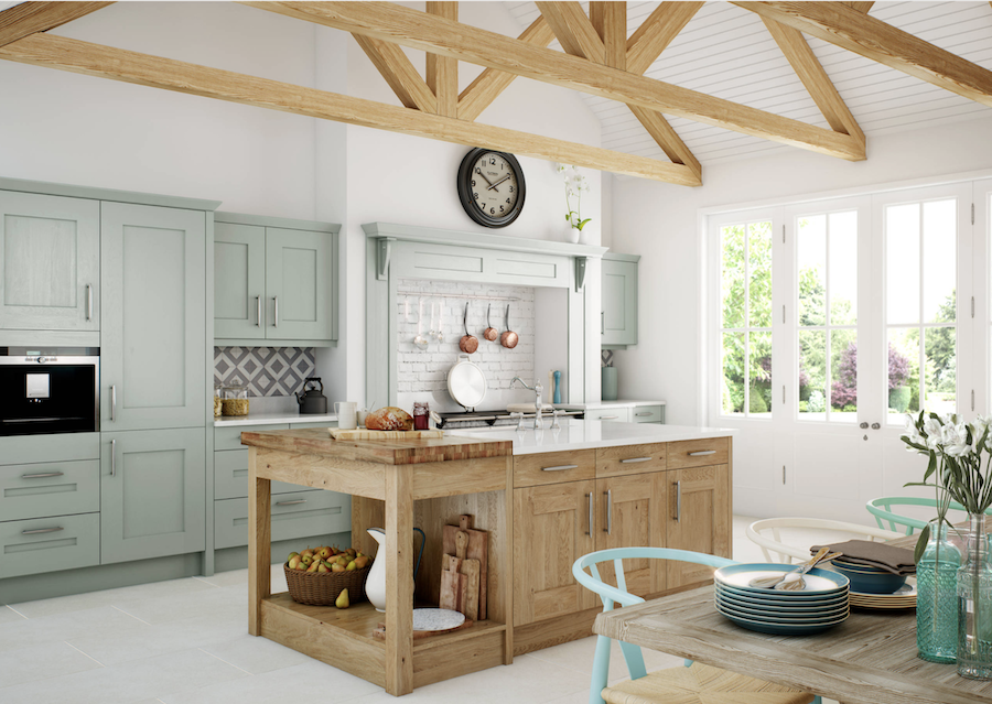 Kitchen featuring green cabinets.