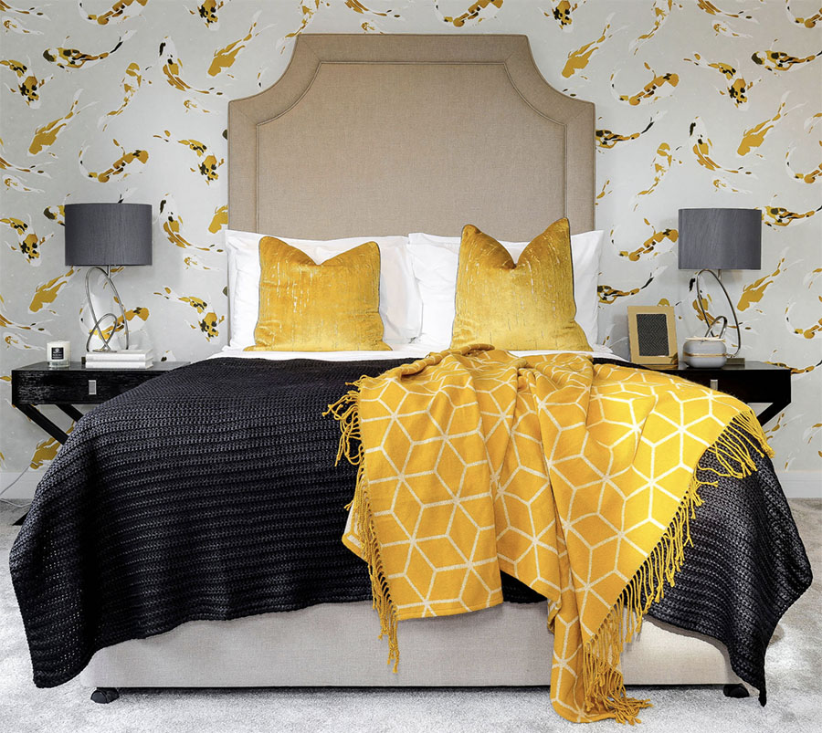 yellow splashed wallpaper in bedroom