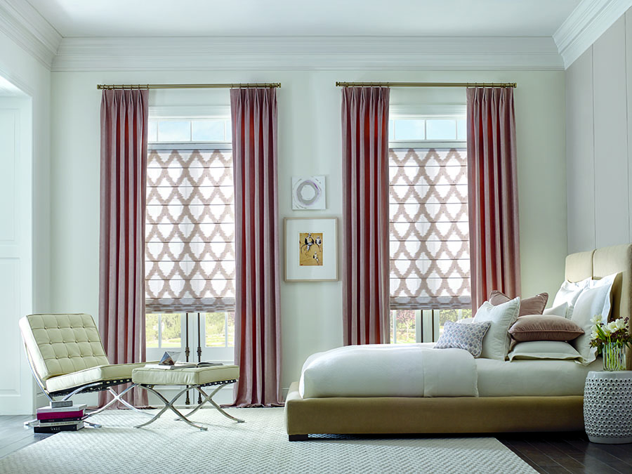 Master bedroom with patterned shades and pink drapes in Folsom CA