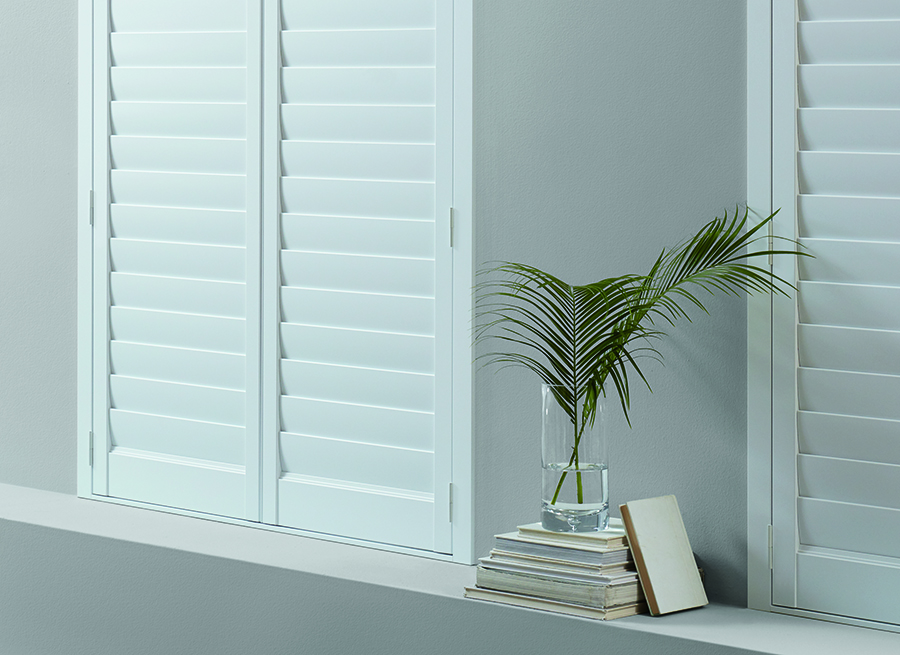 new style hybrid shutters in roseville living room