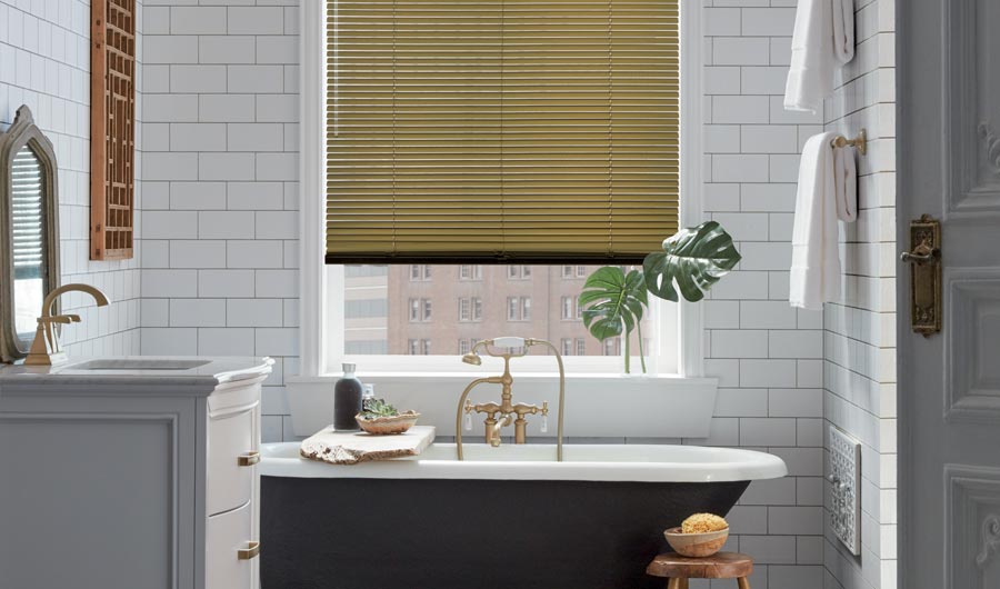 golden metallic blinds in modern bathroom with subway tile in Folsom, CA