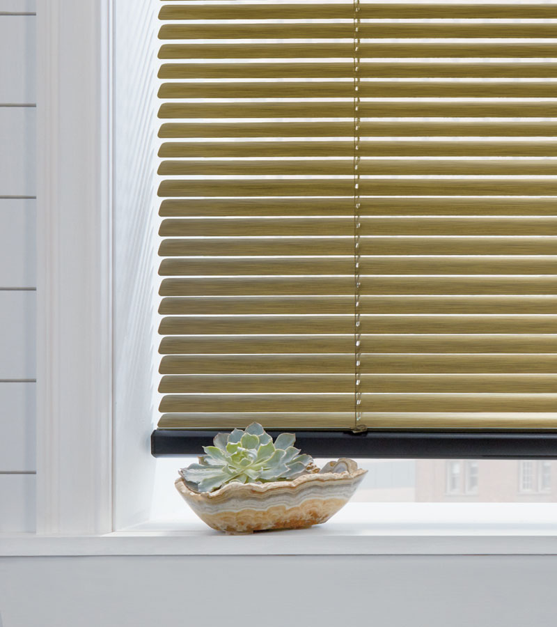 detail of custom green blinds in white Roseville, CA bathroom