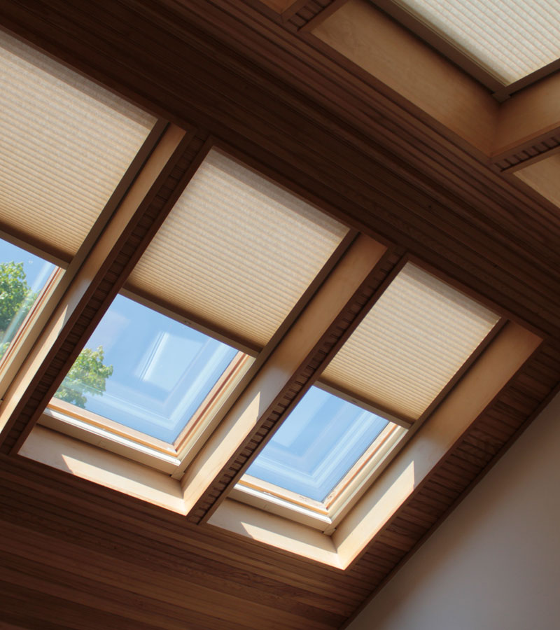 multiple skylights in Roseville, CA home covered with duette honeycomb shades