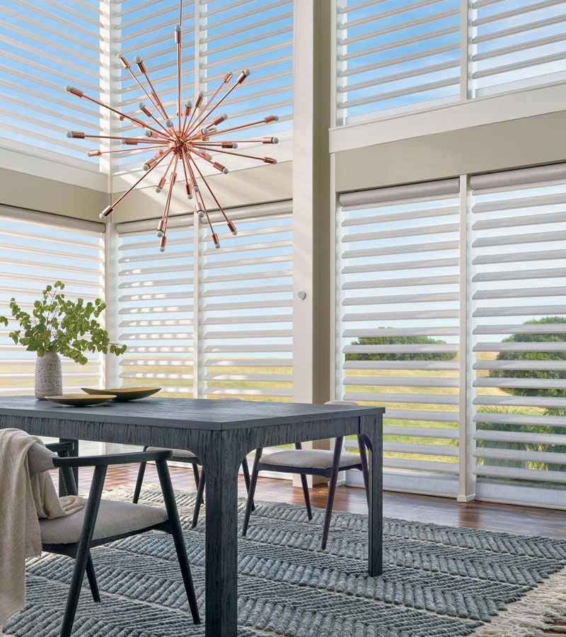 floor to ceiling windows with sheer and fabric pirouette shades in el Dorado Hills, CA home