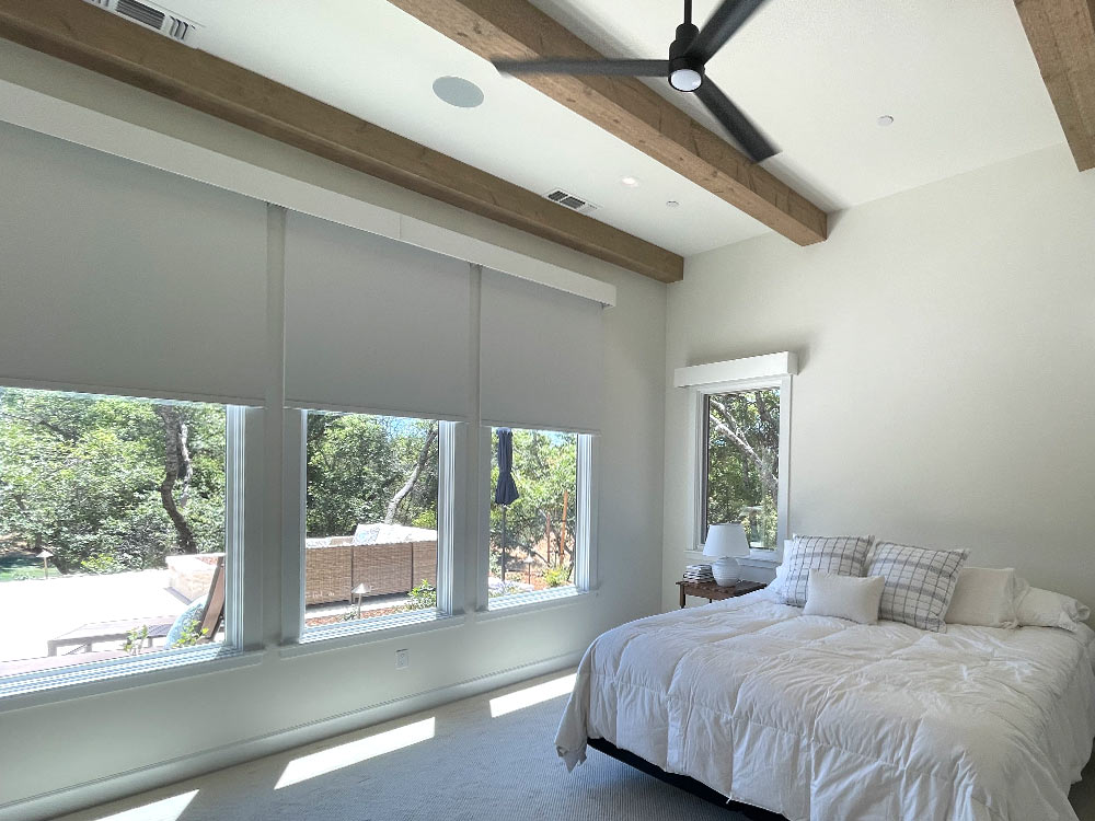 master suite bathroom with white screen shades in california