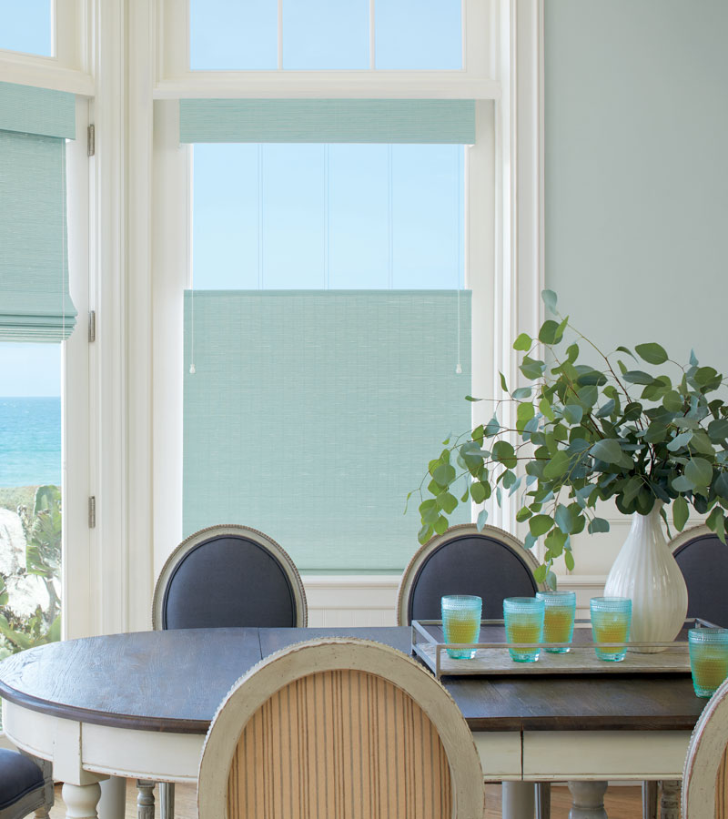 teal woven wood shades in dining room in northern california