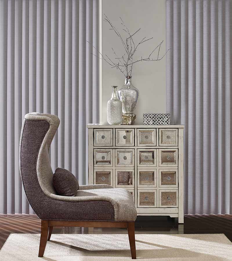 orchid colored modern vertical window shades for room darkening with silver metallic decor accents in Lincoln, CA