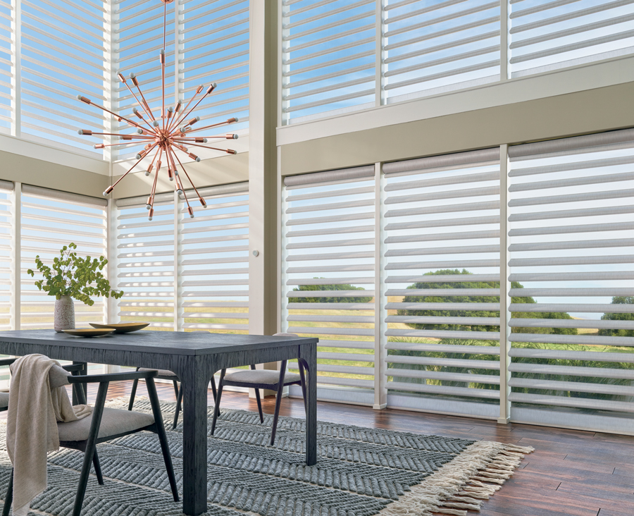 Floor to ceiling windows with pirouette shades