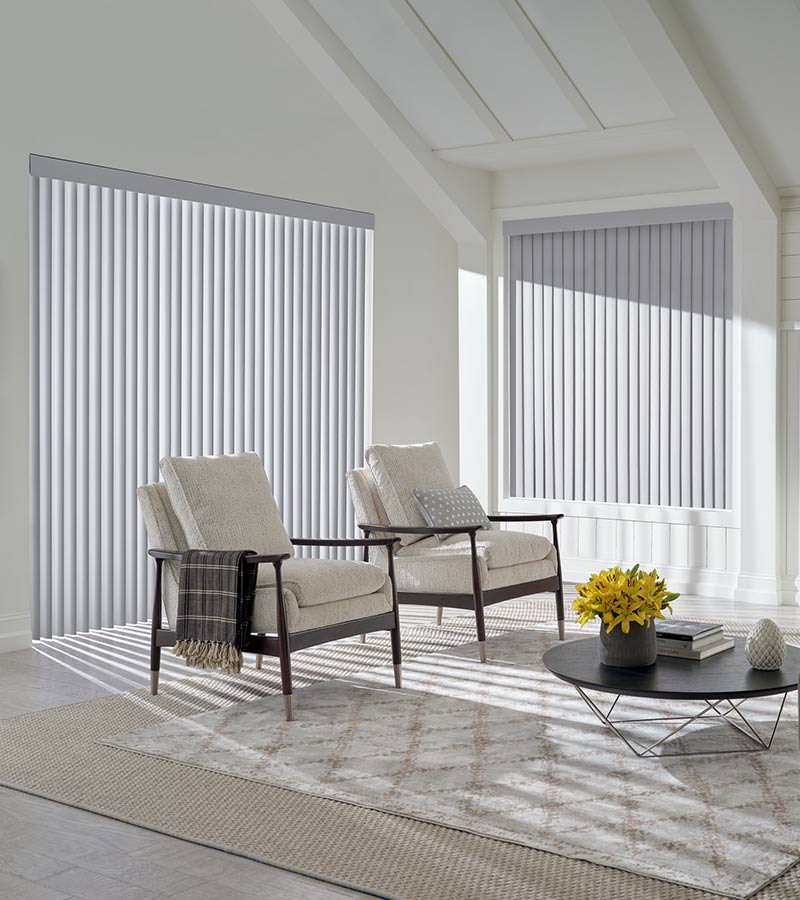 interior of living room space floor to ceiling window and modern armchairs in el dorado hills, CA