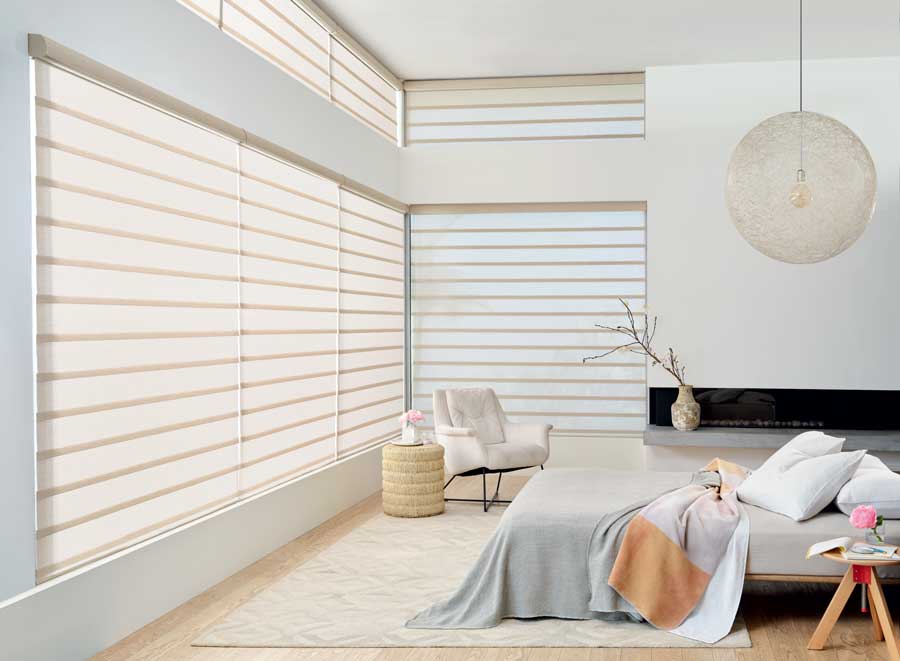 Bedroom with vignette modern roman shades