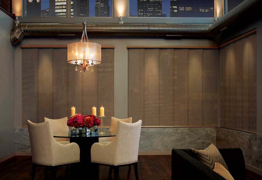 Round table and gliding panels in dining room