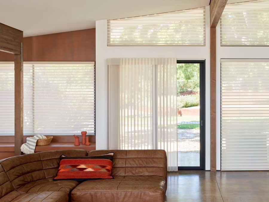 custom vertical luminettes on sliding door with coordinating shades in roseville, ca home