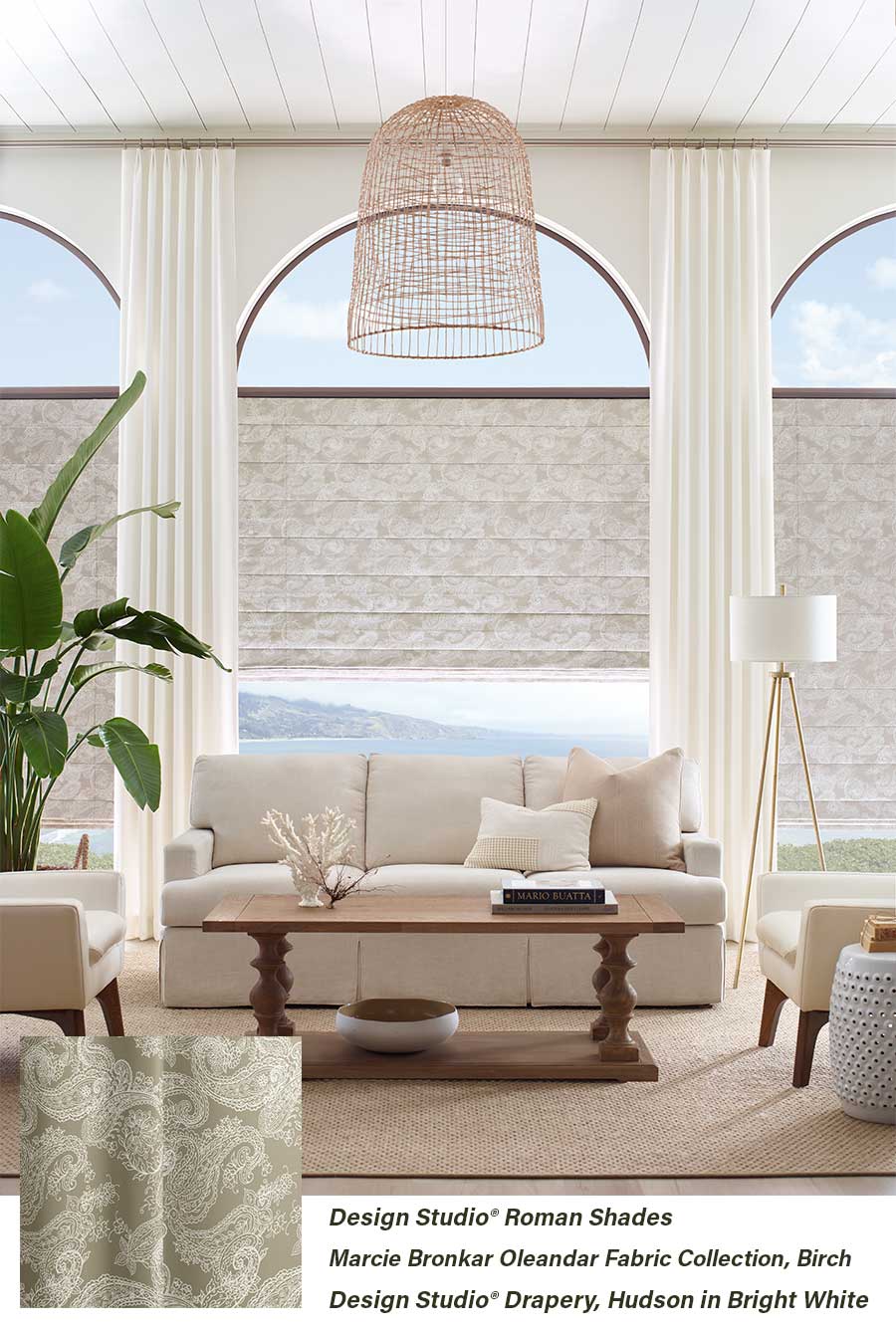 living room neutral colors with large arched windows