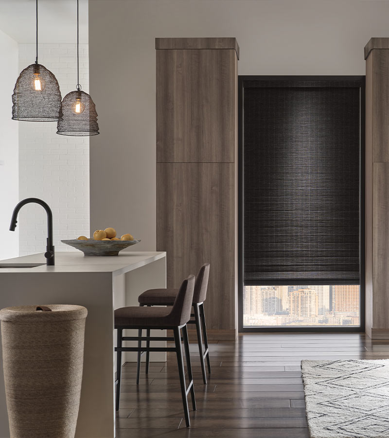 black woven shades on tall kitchen windows
