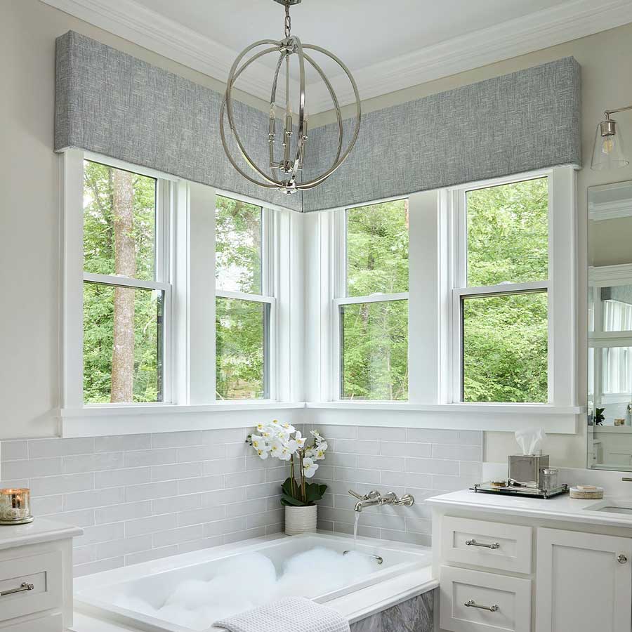 bathroom with gray cornice on windows