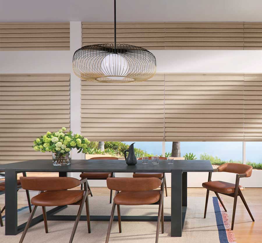 Vignette® Modern Roman Shades on large dining room windows for light control and privacy