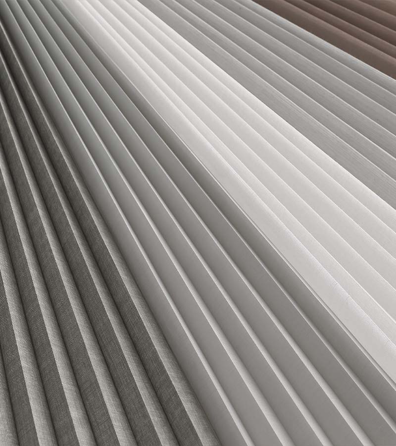 close up of duette vertiglide fabric color options vertical honeycomb shades