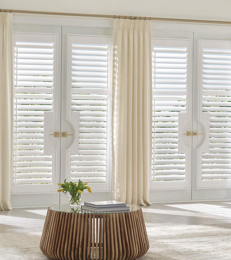Window Coverings for Sliding Glass Doors white shutters California window fashions