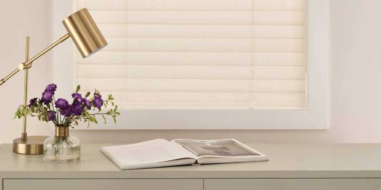 new aria soft blinds porduct in home office with gold lamp