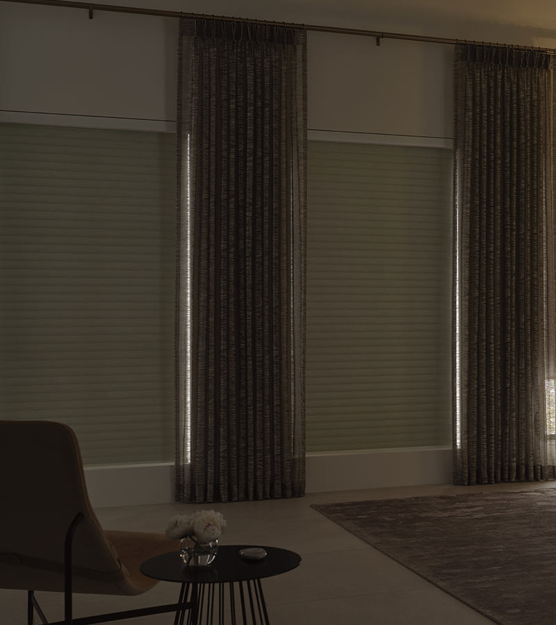 black out shades in bedroom paired with drapery california window fashions