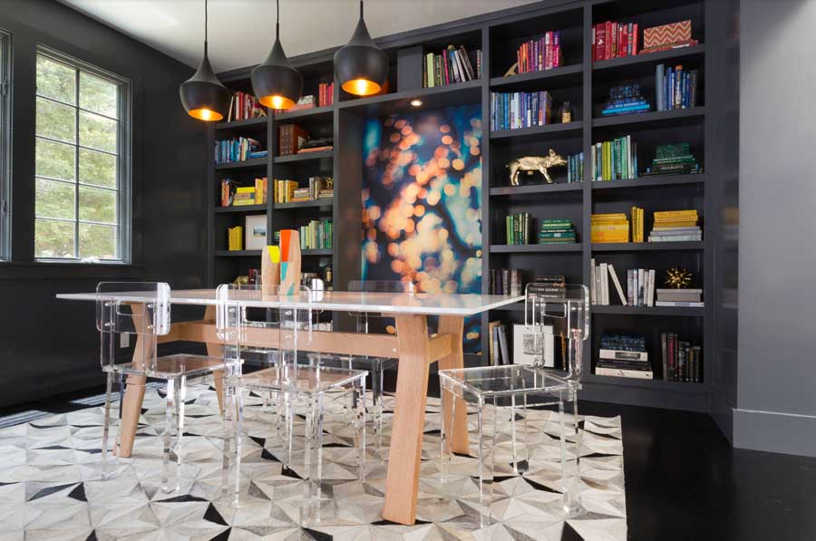 dining room with black built in shelves and pop of all the pantone 2-26 colors