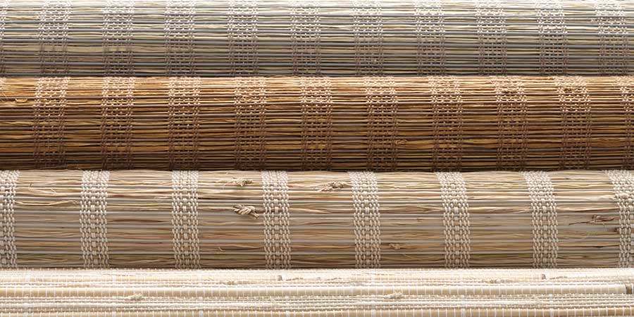 stack of woven wood materials for sustainability in window coverings