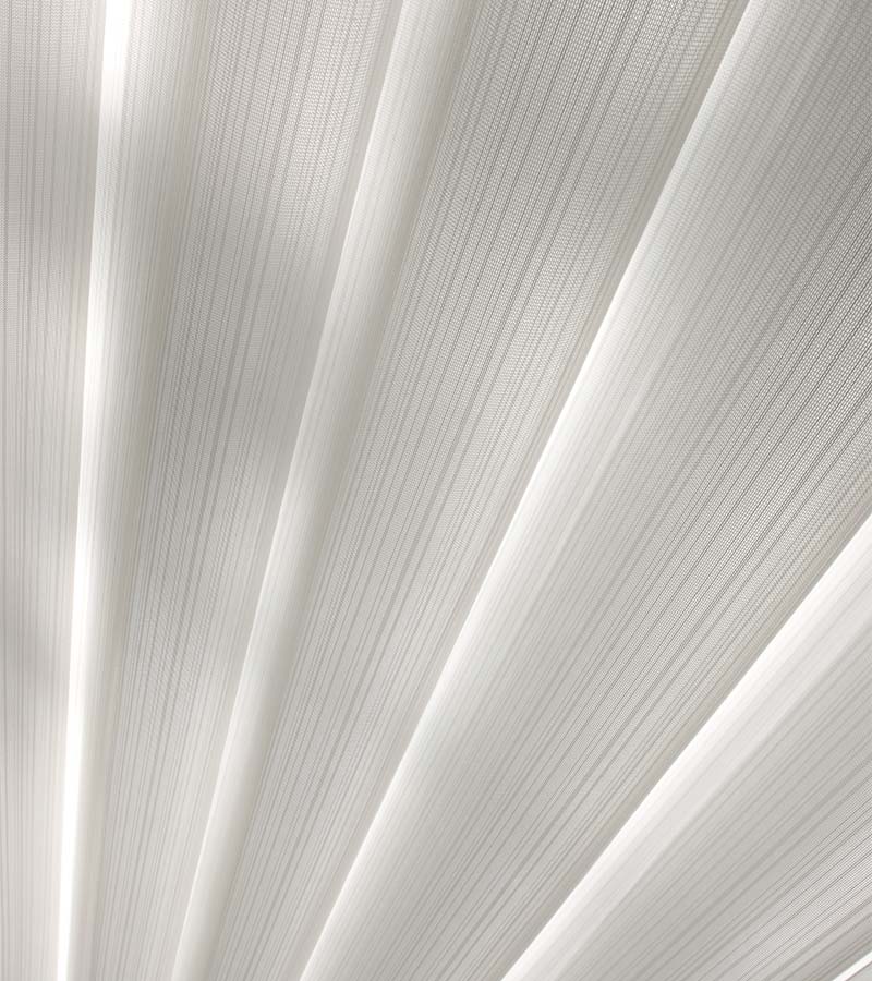 luminette-vertical-sheer-shade-detail-california-window-fashions close up of white sheer fabric on shades