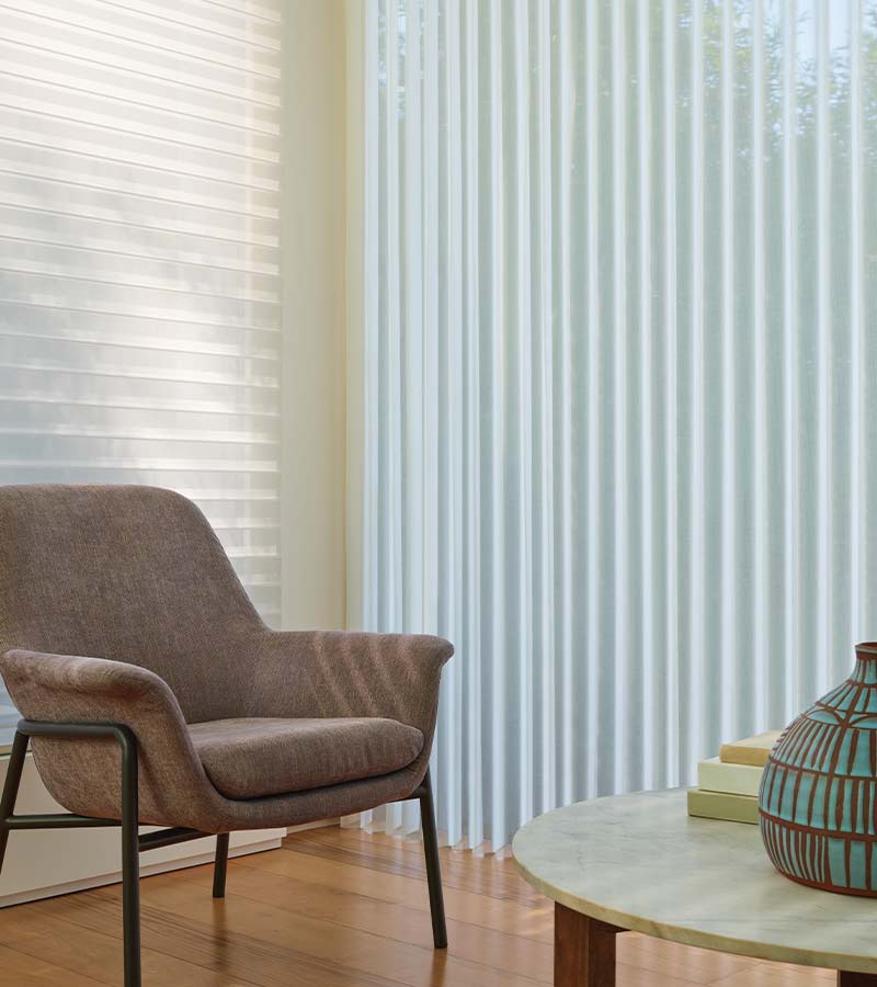 luminette-vertical-sheer-shades-hunter-douglas-california-window-fashions living room with vertical sheer shades luminette