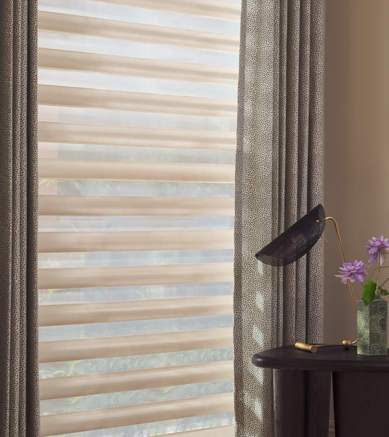 pirouette-window-treatments-layered-drapery-side-panel-details-hunter-douglas-california-window-fashions adjustable fabric vanes on Pirouette shades controlling glare