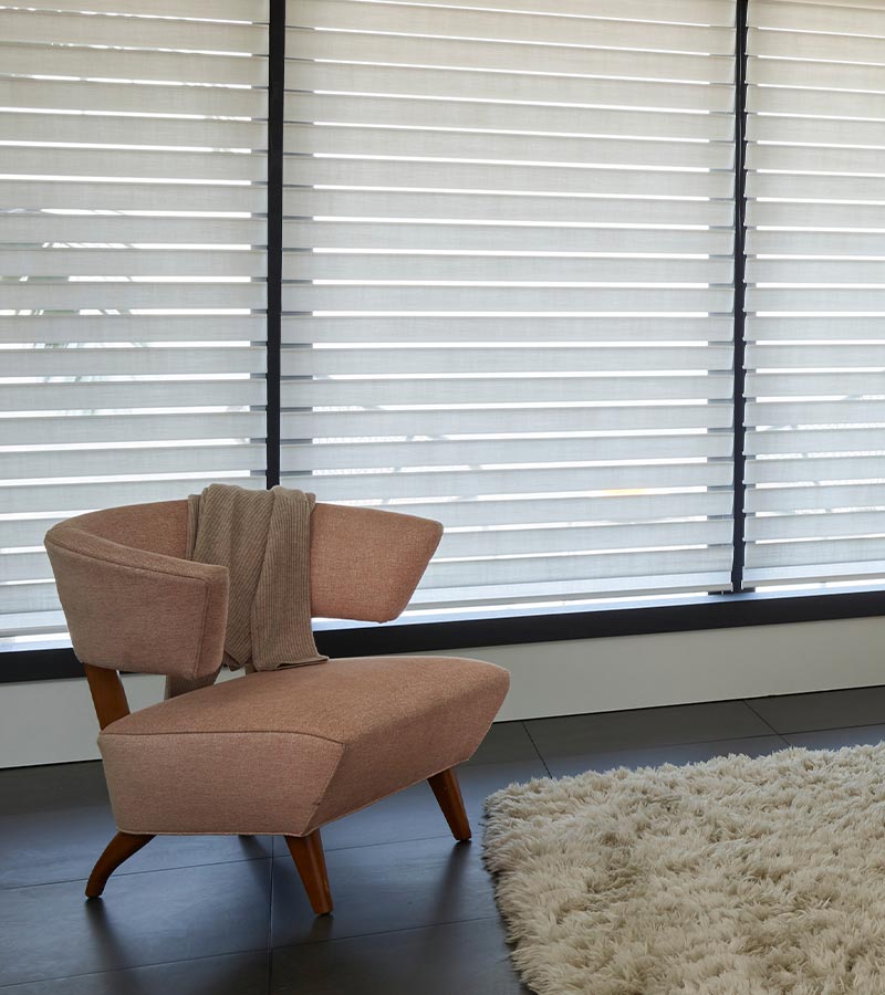 Hunter Douglas Silhouette® shades with sheer fabric vanes and soft filtered sunlight
